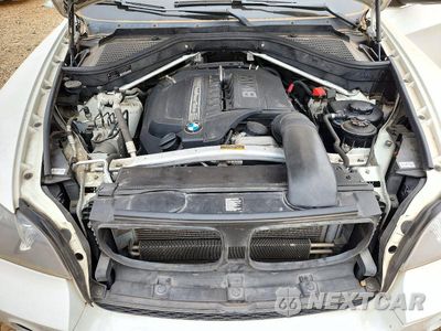 Zdjęcie 12 z 13 samochodu: 2013 BMW X5 XDRIVE35I VIN:5UXZV4C57D0B24877 - miniatura