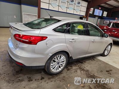 Trzecie zdjęcie samochodu z tyłu: 2018 FORD FOCUS TITANIUM VIN:1FADP3J24JL261748 - miniatura