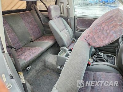 Zdjęcie 10 z 12 samochodu: 1999 CHEVROLET TRACKER VIN:2CNBJ186XX6915553 - miniatura