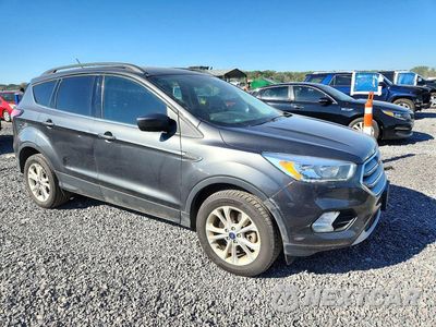 Czwarte zdjęcie samochodu z boku: 2018 FORD ESCAPE SE VIN:1FMCU9GD2JUB12125 - miniatura