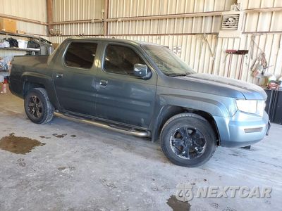 Czwarte zdjęcie samochodu z boku: 2006 HONDA RIDGELINE RTL VIN:2HJYK16576H531413 - miniatura