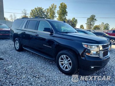 Czwarte zdjęcie samochodu z boku: 2016 CHEVROLET SUBURBAN K1500 LT VIN:1GNSKHKC3GR341933 - miniatura