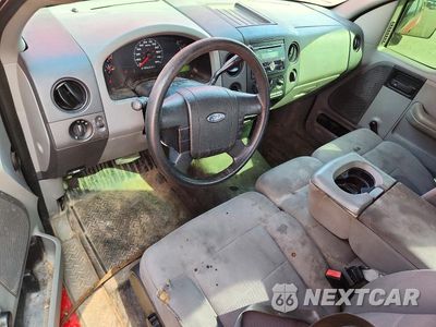 Zdjęcie 8 z 12 samochodu: 2005 FORD F150 VIN:1FTRF02205KD43150 - miniatura