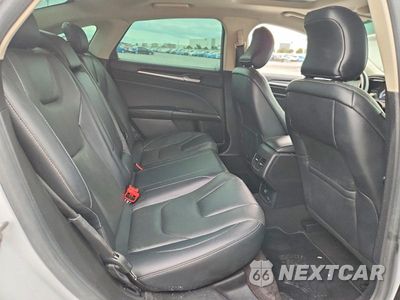 Zdjęcie 10 z 13 samochodu: 2019 FORD FUSION TITANIUM VIN:3FA6P0K92KR182410 - miniatura