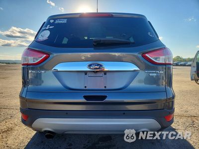Zdjęcie 6 z 13 samochodu: 2014 FORD ESCAPE TITANIUM VIN:1FMCU9J98EUC72620 - miniatura