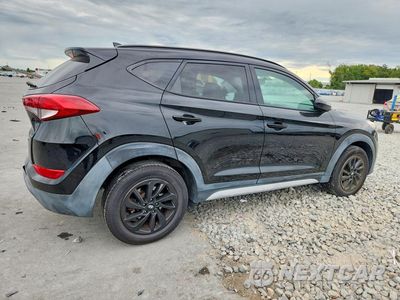 Trzecie zdjęcie samochodu z tyłu: 2018 HYUNDAI TUCSON VIN:KM8J3CA4XJU771389 - miniatura