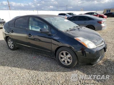 Czwarte zdjęcie samochodu z boku: 2006 TOYOTA PRIUS BASE VIN:JTDKB20UX63171833 - miniatura