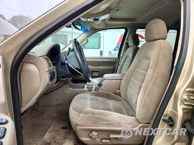 Zdjęcie 7 z 13 samochodu: 2003 FORD EXPLORER XLT VIN:1FMZU83WX3UA06066 - miniatura