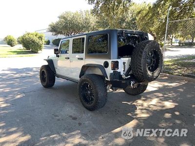 Trzecie zdjęcie samochodu z tyłu: 2015 JEEP WRANGLER UNLIMITED RUBICON VIN:1C4BJWFG3FL530855 - miniatura
