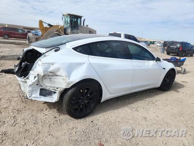 Trzecie zdjęcie samochodu z tyłu: 2019 TESLA MODEL 3 VIN:5YJ3E1EB7KF454684 - miniatura