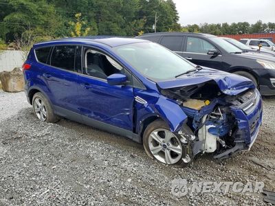 Czwarte zdjęcie samochodu z boku: 2016 FORD ESCAPE SE VIN:1FMCU0G77GUA66564 - miniatura