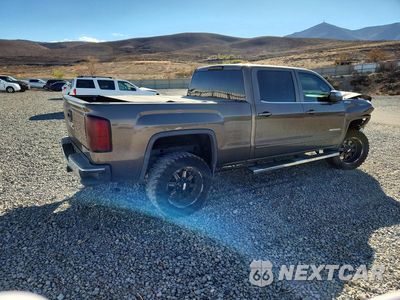 Trzecie zdjęcie samochodu z tyłu: 2015 GMC SIERRA K1500 SLE VIN:3GTU2UEC4FG125254 - miniatura