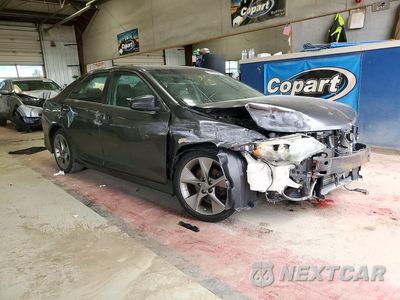 Czwarte zdjęcie samochodu z boku: 2014 TOYOTA CAMRY SE SPORT VIN:4T1BF1FK2EU443512 - miniatura