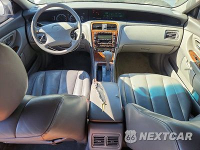 Zdjęcie 8 z 12 samochodu: 2000 TOYOTA AVALON XLS VIN:4T1BF28B4YU100076 - miniatura