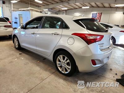 Drugie zdjęcie samochodu z przodu: 2013 HYUNDAI ELANTRA GT BASE VIN:KMHD35LE5DU103132 - miniatura