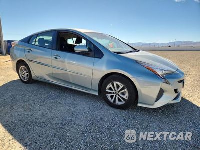 Czwarte zdjęcie samochodu z boku: 2016 TOYOTA PRIUS TWO VIN:JTDKBRFU5G3510290 - miniatura