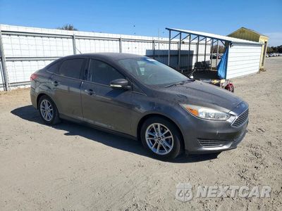 Czwarte zdjęcie samochodu z boku: 2016 FORD FOCUS SE VIN:1FADP3F27GL263169 - miniatura