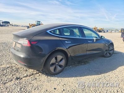 Trzecie zdjęcie samochodu z tyłu: 2019 TESLA MODEL 3 VIN:5YJ3E1EB7KF208671 - miniatura