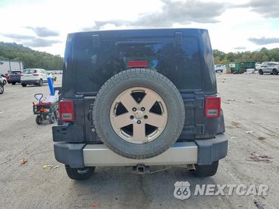Zdjęcie 6 z 14 samochodu: 2011 JEEP WRANGLER UNLIMITED SAHARA VIN:1J4BA5H16BL526581 - miniatura