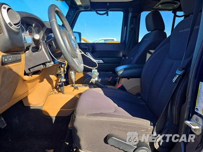Zdjęcie 7 z 13 samochodu: 2013 JEEP WRANGLER UNLIMITED RUBICON VIN:1C4HJWFG9DL513355 - miniatura