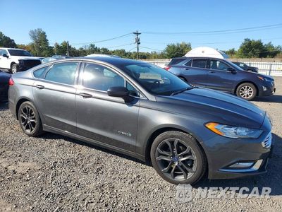 Czwarte zdjęcie samochodu z boku: 2018 FORD FUSION SE HYBRID VIN:3FA6P0LU4JR239143 - miniatura