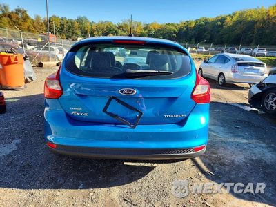 Zdjęcie 6 z 12 samochodu: 2014 FORD FOCUS TITANIUM VIN:1FADP3N22EL338603 - miniatura