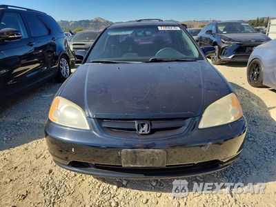 Piąte zdjęcie samochodu w środku: 2003 HONDA CIVIC LX VIN:1HGEM22593L038751 - miniatura