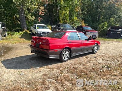 Czwarte zdjęcie samochodu z boku: 1991 ALFA ROMEO 164 SPORT VIN:ZAREA33E1M6216041 - miniatura