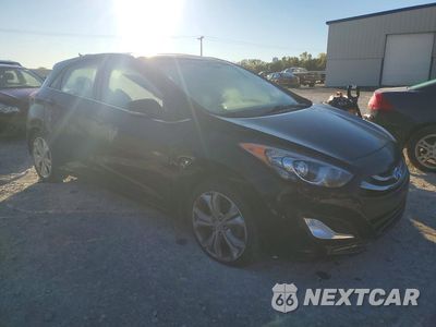 Czwarte zdjęcie samochodu z boku: 2014 HYUNDAI ELANTRA GT BASE VIN:KMHD35LHXEU188920 - miniatura