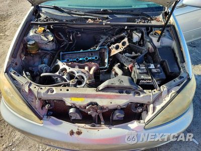 Zdjęcie 11 z 13 samochodu: 2003 TOYOTA CAMRY LE VIN:4T1BE32K43U788199 - miniatura