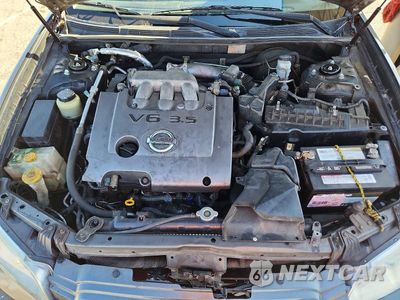 Zdjęcie 11 z 12 samochodu: 2003 NISSAN MAXIMA GXE VIN:JN1DA31DX3T520469 - miniatura