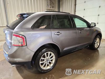 Trzecie zdjęcie samochodu z tyłu: 2010 FORD EDGE SEL VIN:2FMDK4JC7ABA72708 - miniatura