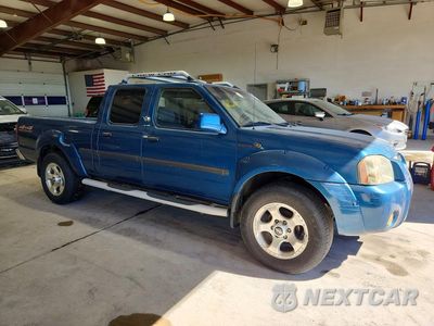 Czwarte zdjęcie samochodu z boku: 2002 NISSAN FRONTIER SVE-V6 VIN:1N6MD29Y92C312360 - miniatura