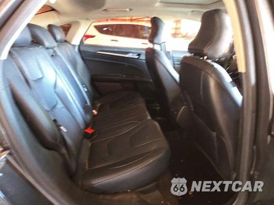Zdjęcie 10 z 12 samochodu: 2017 FORD FUSION TITANIUM VIN:3FA6P0K90HR130511 - miniatura