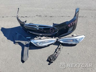 Zdjęcie 12 z 13 samochodu: 2015 TESLA MODEL S 85D VIN:5YJSA1H26FF086913 - miniatura
