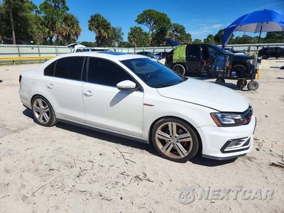 Czwarte zdjęcie samochodu z boku: 2016 VOLKSWAGEN JETTA GLI VIN:3VW5T7AJ6GM411677 - miniatura