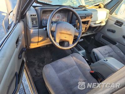Zdjęcie 8 z 13 samochodu: 2003 JEEP WRANGLER COMMANDO VIN:1J4FA39S53P320143 - miniatura