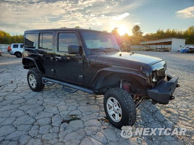 Czwarte zdjęcie samochodu z boku: 2013 JEEP WRANGLER UNLIMITED SAHARA VIN:1C4BJWEG8DL666266 - miniatura