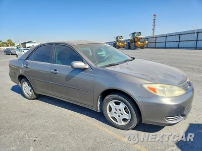Czwarte zdjęcie samochodu z boku: 2003 TOYOTA CAMRY LE V6 VIN:4T1BF32K33U555105 - miniatura