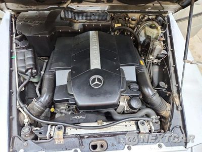Zdjęcie 12 z 13 samochodu: 2002 MERCEDES-BENZ G 500 VIN:WDCYR49E02X133800 - miniatura