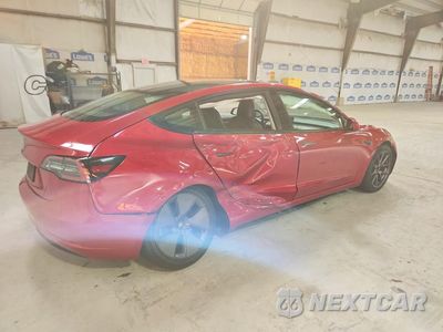 Trzecie zdjęcie samochodu z tyłu: 2022 TESLA MODEL 3 VIN:5YJ3E1EA1NF370355 - miniatura