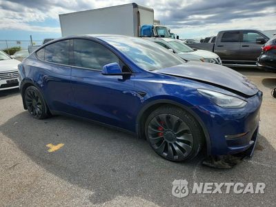 Czwarte zdjęcie samochodu z boku: 2022 TESLA MODEL Y VIN:7SAYGDEFXNF309778 - miniatura