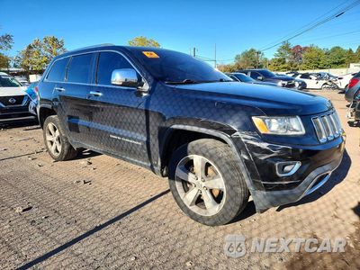 Czwarte zdjęcie samochodu z boku: 2014 JEEP GRAND CHEROKEE LIMITED VIN:1C4RJFBG0EC184377 - miniatura