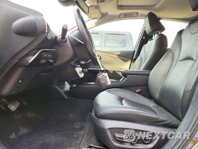 Zdjęcie 7 z 12 samochodu: 2017 TOYOTA PRIUS FOUR VIN:JTDKARFU7H3542551 - miniatura