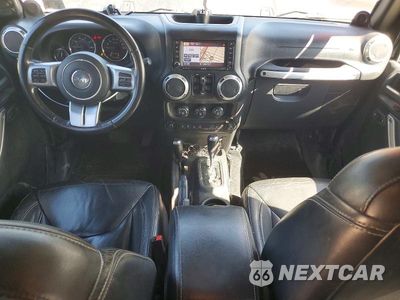 Zdjęcie 8 z 13 samochodu: 2014 JEEP WRANGLER UNLIMITED RUBICON VIN:1C4HJWFG1EL220681 - miniatura