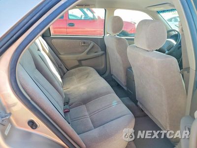 Zdjęcie 10 z 12 samochodu: 1999 TOYOTA CAMRY LE VIN:JT2BG22K5X0326667 - miniatura