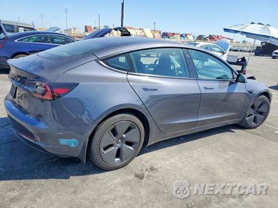 Trzecie zdjęcie samochodu z tyłu: 2021 TESLA MODEL 3 VIN:5YJ3E1EA4MF994732 - miniatura