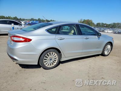 Trzecie zdjęcie samochodu z tyłu: 2013 FORD FUSION SE HYBRID VIN:3FA6P0LU4DR123185 - miniatura