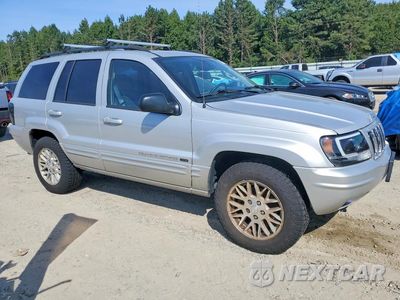 Czwarte zdjęcie samochodu z boku: 2003 JEEP GRAND CHEROKEE LIMITED VIN:1J4GW58N23C506629 - miniatura