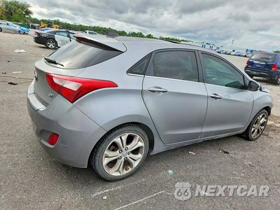 Trzecie zdjęcie samochodu z tyłu: 2013 HYUNDAI ELANTRA GT BASE VIN:KMHD35LE7DU092652 - miniatura